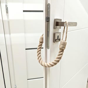 Door Stop. Chunky jute door stopper is a stylish and eco-friendly home accessory