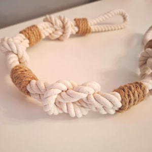 Curtain holdback. Curtain tieback made of cotton and jute rope. eco-friendly home decor