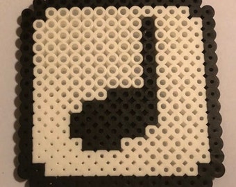 Nintendo Perler Bead 8-BIt Pixel Art of a Music Note Block from Super Mario Bros 3