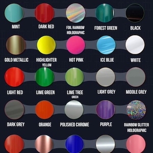 May include: A color chart featuring thirty-two circular swatches arranged in rows on a dark background. Each circle displays a distinct color or finish, including azure blue, brown, burgundy, cobalt blue, copper metallic, mint, dark red, foil rainbow holographic, forest green, black, gold metallic, highlighter yellow, hot pink, ice blue, white, light red, lime green, lime tree green, light grey, middle grey, dark grey, orange, polished chrome, purple, rainbow glitter holographic, red, rose gold, royal blue, silver metallic, soft pink, turquoise, and yellow.