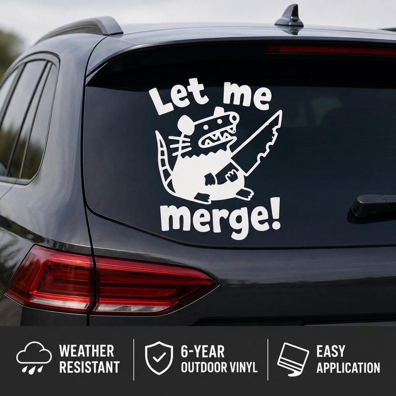 May include: A white vinyl decal applied to a car rear window featuring a cartoon opossum holding a large serrated knife. The text above the opossum reads Let me and the text below the opossum reads merge! in a bold, rounded white font style.