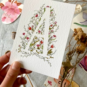 Carte A comme Amour - Monogramme aquarelle fleurs et feuillages