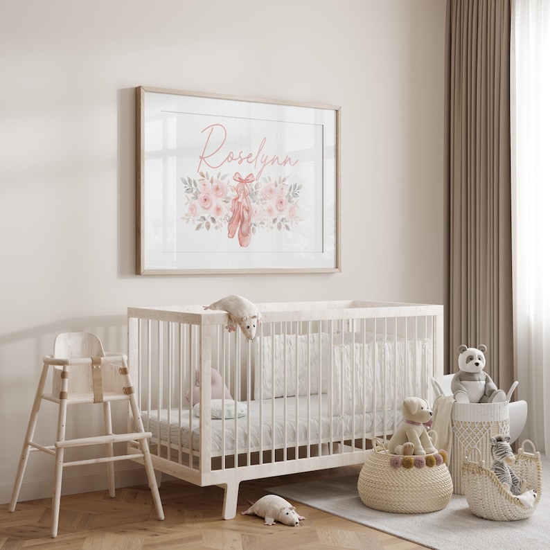 May include: A nursery scene featuring a white crib, a high chair, and decorative baskets. A framed print above the crib displays the name "Roselynn" with ballet shoes and floral accents. Plush toys and a rug complete the room's decor.