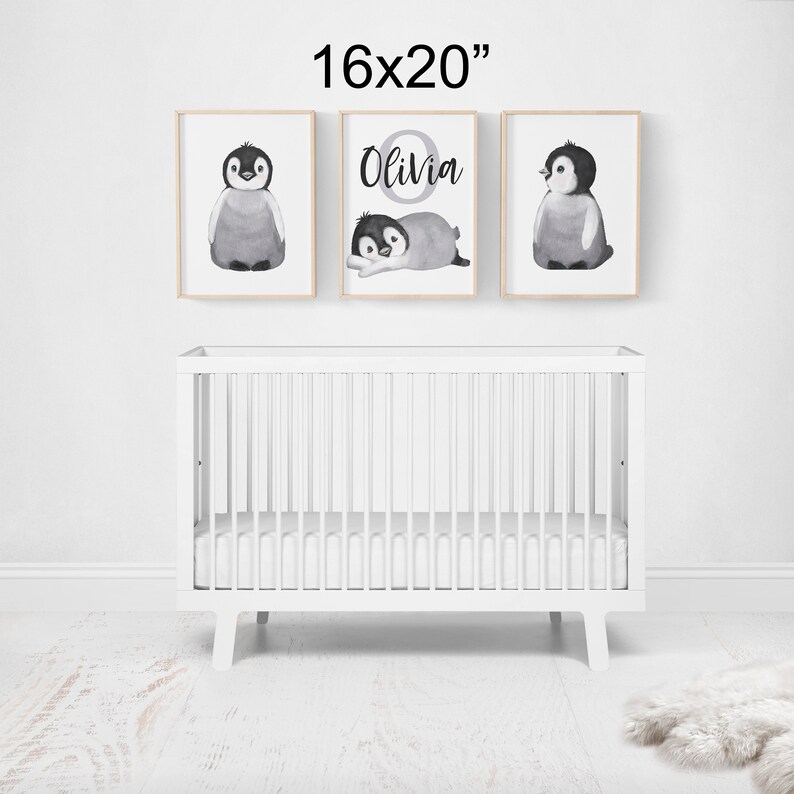 May include: Three black and white penguin illustrations in 16x20 inch frames. The center frame features the name "Olivia" in a circle with a penguin inside.