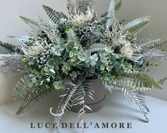 Winter Wonderland floral arrangement presented in a hat box
