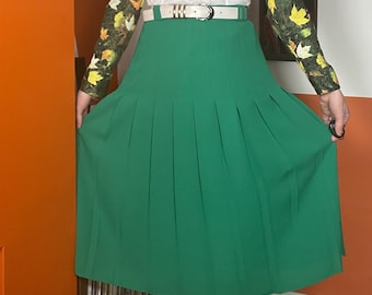 Falda midi plisada verde lisa estilo vintage de los 90, ideal para primavera y verano.