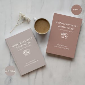 May include: Two rectangular score books in mocha and chocolate colors with white text reading Marriage Isn't About Keeping Score (Unless It's Game Night) and Mr & Mrs Smith's Game Night Score Book, featuring a white playing card icon.