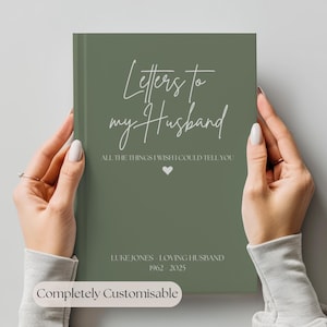 May include: A sage green journal with the title "Letters to my Husband" in white script. The cover features the text "ALL THE THINGS I WISH I COULD TELL YOU", a heart symbol, and the name "LUKE JONES LOVING HUSBAND 1962-2025". The bottom of the image reads "Completely Customisable".