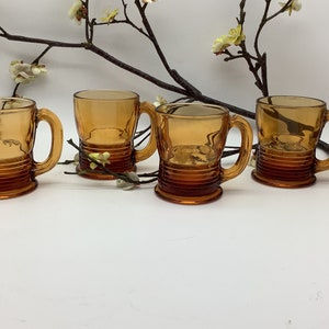 Vintage set 4 pc Amber Gold Glass Coffee Teacup Ring Ribbed Base