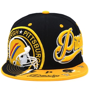 May include: A black baseball cap with a yellow brim featuring embroidered Pittsburgh text and a football helmet graphic. The design includes a circular logo with a yellow helmet, a white face mask, and red, blue, and yellow stripes on the side.