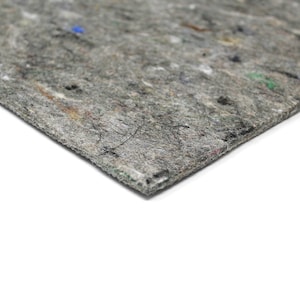 Puede incluir: Primer plano de un material insonorizante rectangular gris texturizado.
