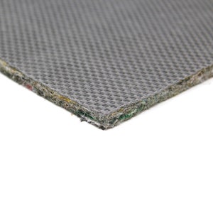 Puede incluir: Primer plano de un material de base gris texturizado. La base est&aacute; hecha de m&uacute;ltiples capas de tela y tiene una textura tejida.