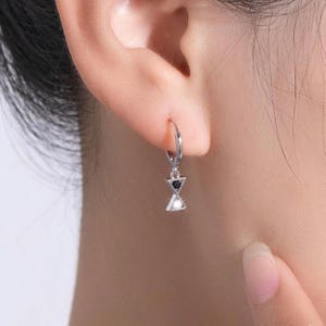 Sterling Silver Hourglass Hoop Earrings: CZ & Zirconium Huggies