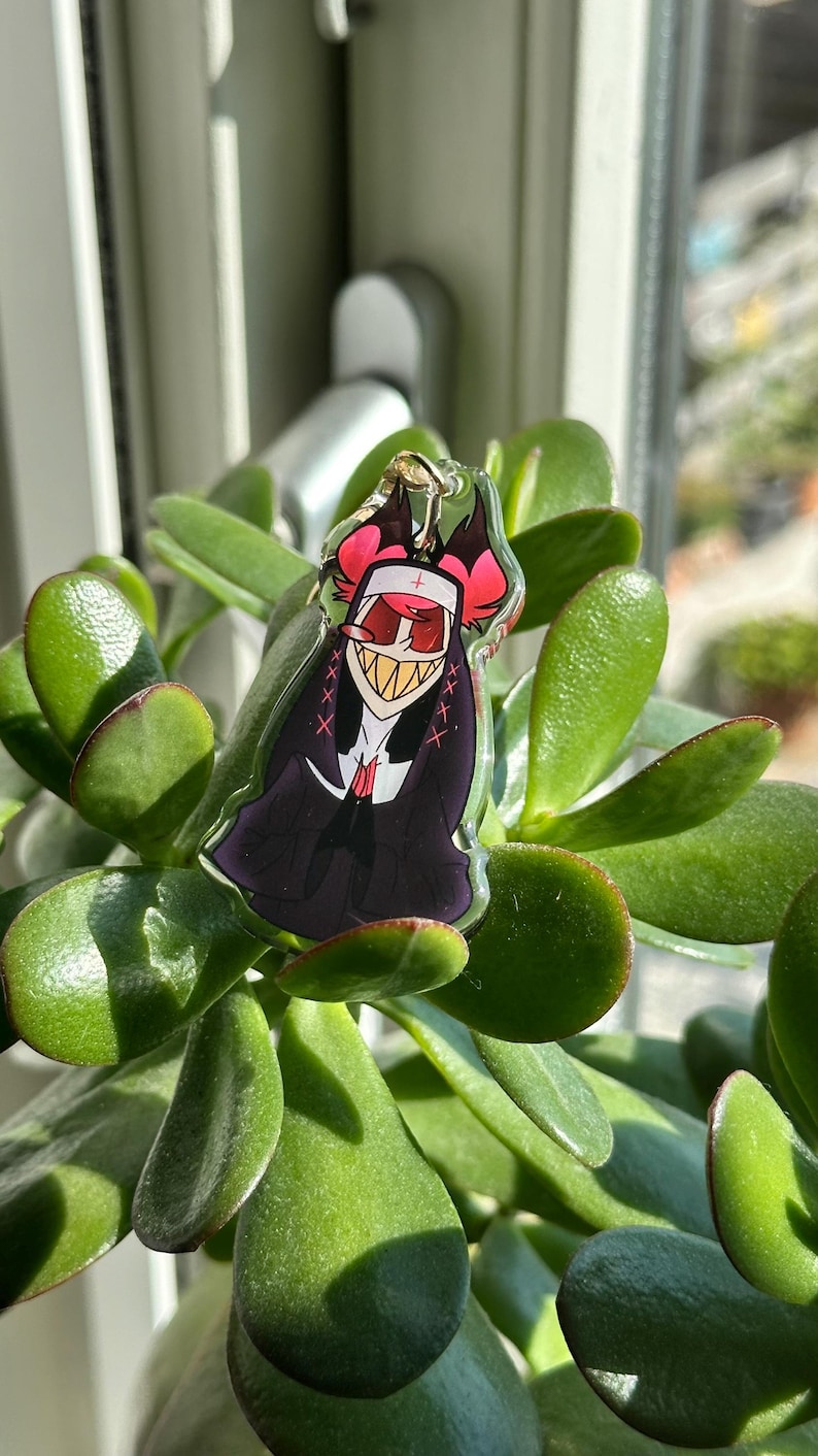Vox, Lucifer & Alastor Hazbin Hotel Keychain - Perfect for fans! Enchanting design and decorative. Must-have for Hazbin Hotel enthusiast! image 4