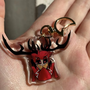 Vox, Lucifer & Alastor Hazbin Hotel Keychain - Perfect for fans! Enchanting design and decorative. Must-have for Hazbin Hotel enthusiast! Demon Alastor