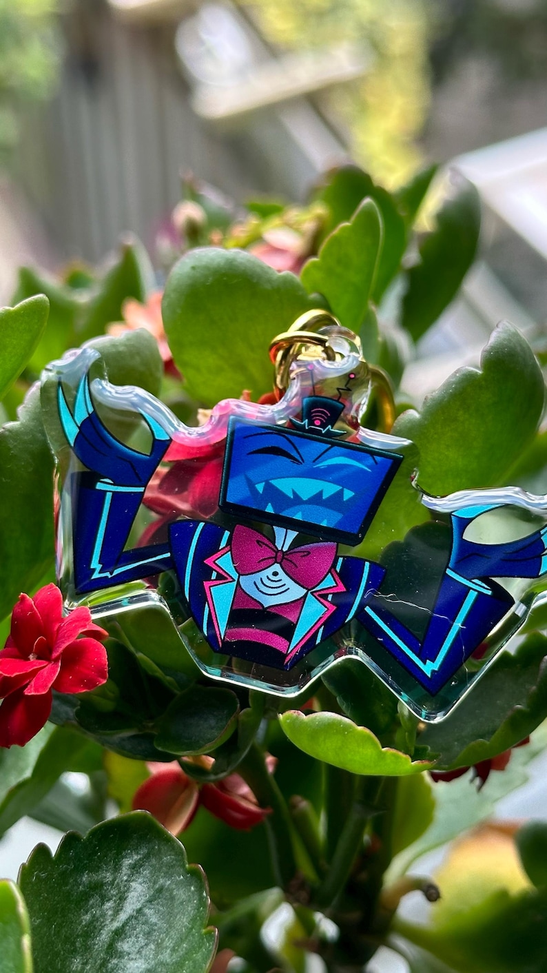 Vox, Lucifer & Alastor Hazbin Hotel Keychain - Perfect for fans! Enchanting design and decorative. Must-have for Hazbin Hotel enthusiast! image 11