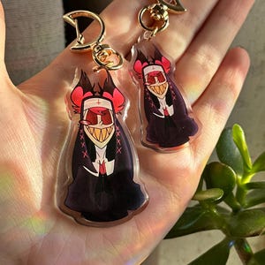Vox, Lucifer & Alastor Hazbin Hotel Keychain - Perfect for fans! Enchanting design and decorative. Must-have for Hazbin Hotel enthusiast! Nune Alastor (Small)