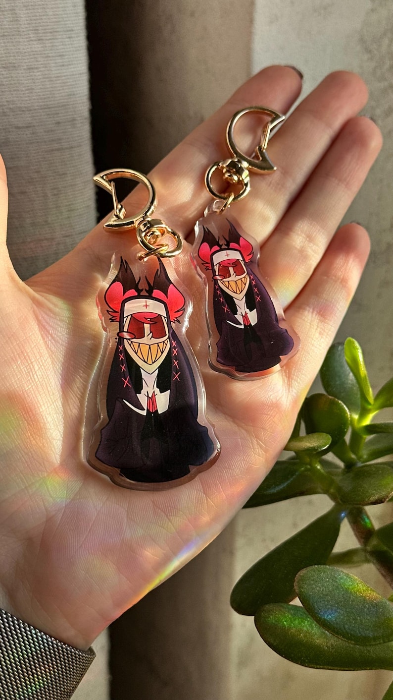 Vox, Lucifer & Alastor Hazbin Hotel Keychain - Perfect for fans! Enchanting design and decorative. Must-have for Hazbin Hotel enthusiast! Nune Alastor (Small)