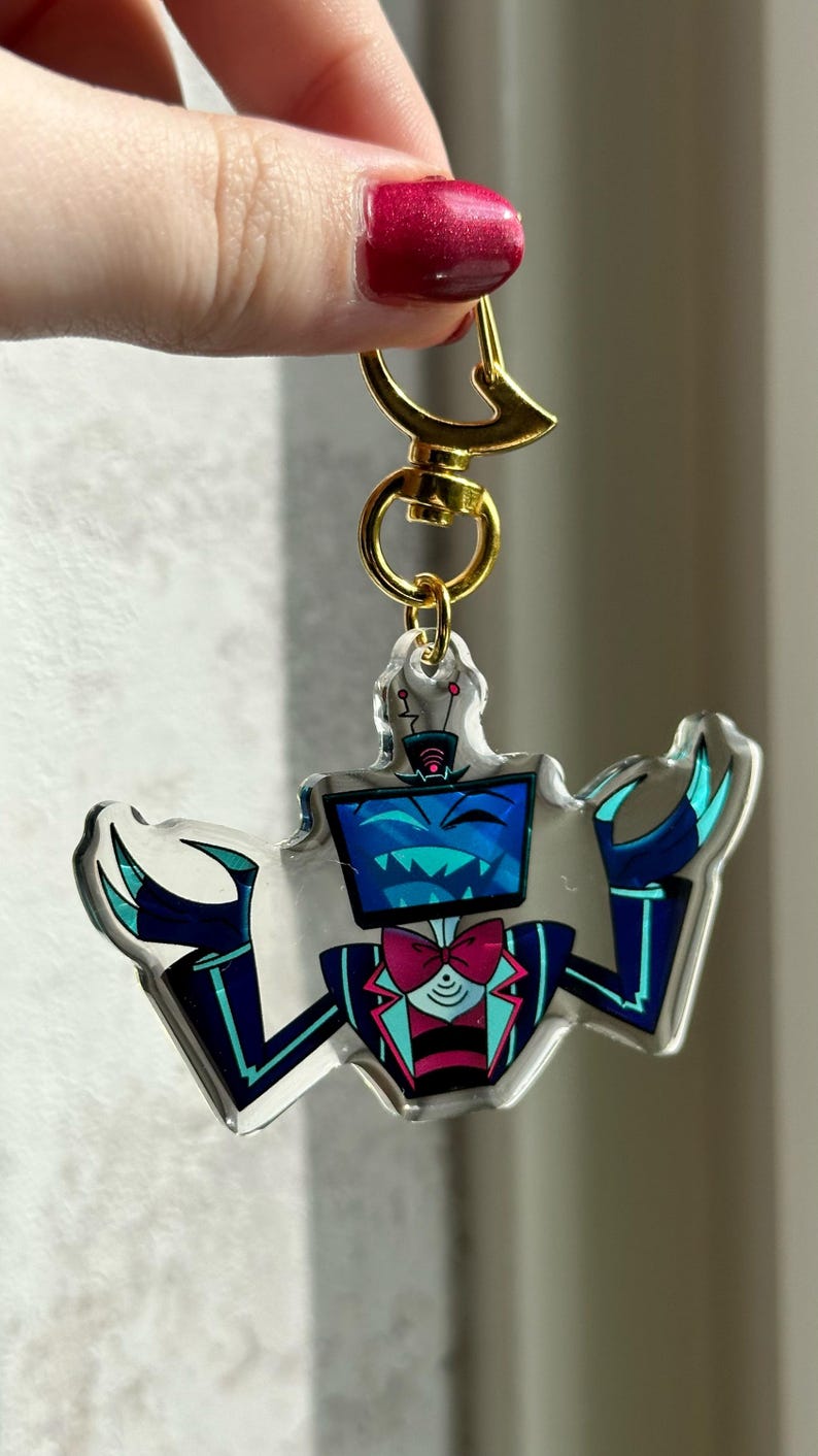 Vox, Lucifer & Alastor Hazbin Hotel Keychain - Perfect for fans! Enchanting design and decorative. Must-have for Hazbin Hotel enthusiast! Vox
