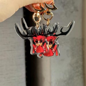 Vox, Lucifer & Alastor Hazbin Hotel Keychain - Perfect for fans! Enchanting design and decorative. Must-have for Hazbin Hotel enthusiast! image 10
