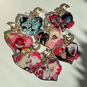 Hazbin Hotel Apoxy Keychains: Alastor, Vaggie, Husk, Angel Dust, Charlie, Valentino, Vox, Lucifer, Lilith, Cherri, Sir P, Niffty, Rosie