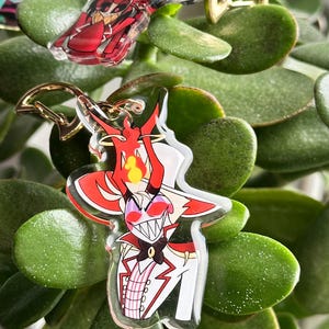 Vox, Lucifer & Alastor Hazbin Hotel Keychain - Perfect for fans! Enchanting design and decorative. Must-have for Hazbin Hotel enthusiast! image 12
