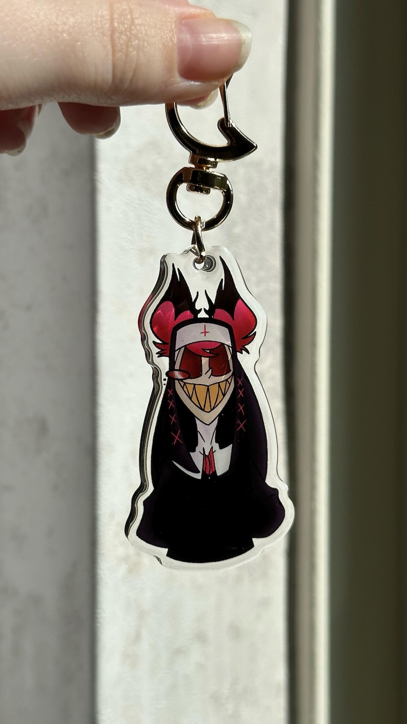 Vox, Lucifer & Alastor Hazbin Hotel Keychain - Perfect for fans! Enchanting design and decorative. Must-have for Hazbin Hotel enthusiast! Nune Alastor