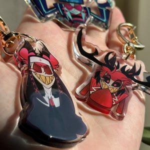 Vox, Lucifer & Alastor Hazbin Hotel Keychain - Perfect for fans! Enchanting design and decorative. Must-have for Hazbin Hotel enthusiast! image 6
