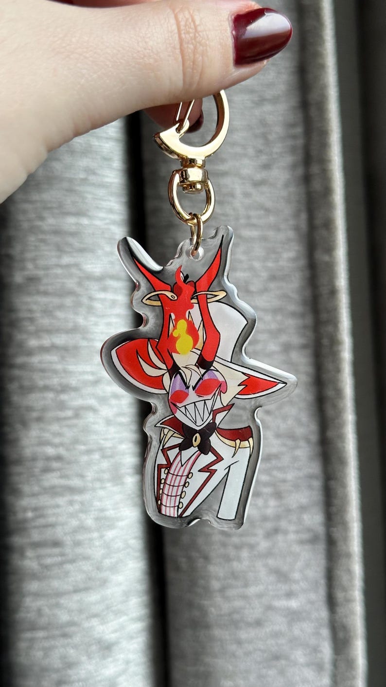 Vox, Lucifer & Alastor Hazbin Hotel Keychain - Perfect for fans! Enchanting design and decorative. Must-have for Hazbin Hotel enthusiast! Lucifer