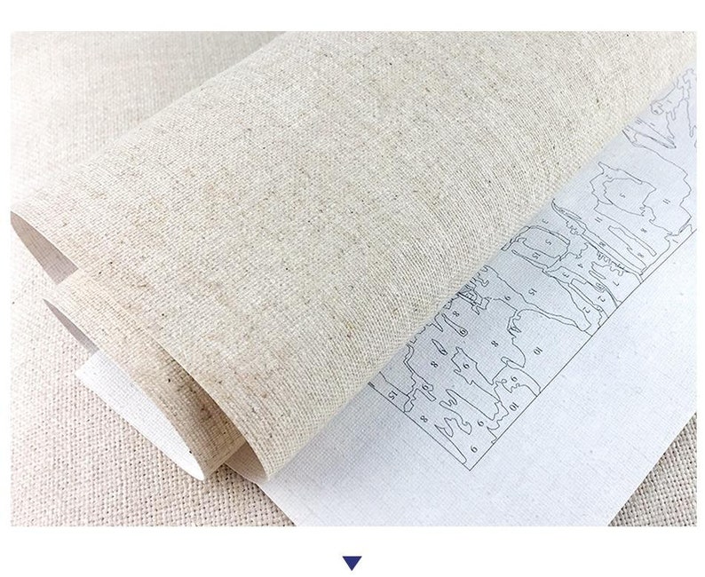 May include: A close-up of a beige canvas with a paint-by-numbers design printed on it. The design features a landscape with numbered sections for painting.