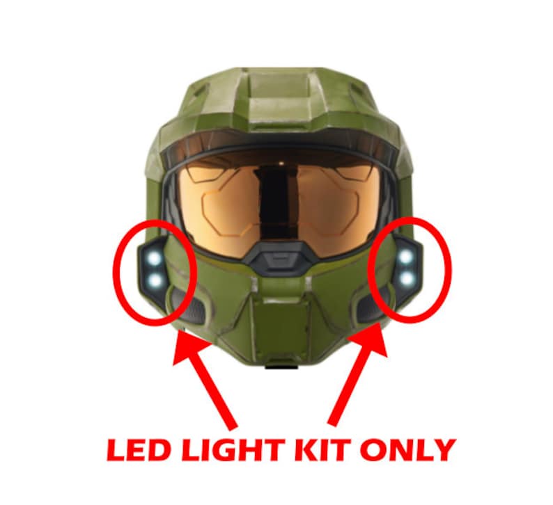 K&ouml;nnte beinhalten: Gr&uuml;ner und schwarzer Plastikhelm mit zwei LED-Lichtkits, die an den Seiten befestigt sind. Der Text "LED LIGHT KIT ONLY" ist unter dem Helm aufgedruckt.