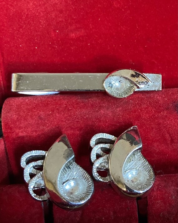 Cuff links and tie clip