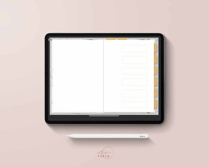May include: A digital planner displayed on a black tablet, featuring a grid layout and labeled tabs in shades of yellow. A white stylus rests below the tablet. The words "utopic paper" are in the bottom right corner.