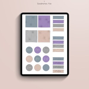 May include: Digital planner stickers displayed on a tablet. The stickers include floral squares, rectangular labels, and circular day-of-the-week labels. The color palette features muted tones of blue, purple, beige, and gray. Text on the stickers includes "Tasks" and "Notes".