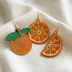 May include: A white ceramic mug with a black handle and the text "But First, Coffee" in a bold, black font. The mug is set against a blurred background, suggesting a cosy setting.