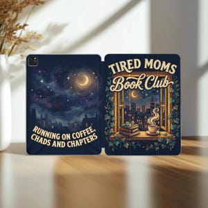 May include: A dark blue tablet case with a night sky design and the text "Running on Coffee, Chads and Chapters." The other side features a window scene with the text "Tired Moms Book Club."