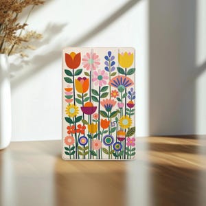 May include: A rectangular tablet case featuring a cream-colored background with a vibrant, repeating pattern of stylized flowers in shades of red, orange, yellow, pink, blue, and green, arranged on thin vertical stems across the entire surface.