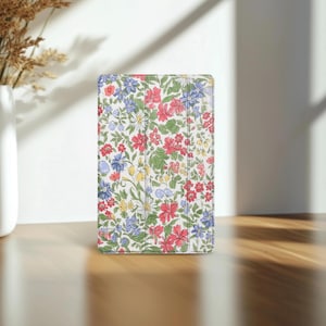 May include: A set of three ceramic mugs with a speckled, matte finish. The mugs are in shades of cream, light gray, and dark gray. Each mug has a simple, minimalist design, perfect for coffee or tea.