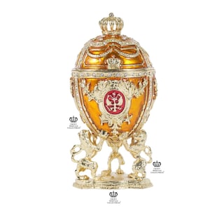Imperial Faberge large orange and gold plated coronation egg. Great for decor! Great for a family or friend gift!
