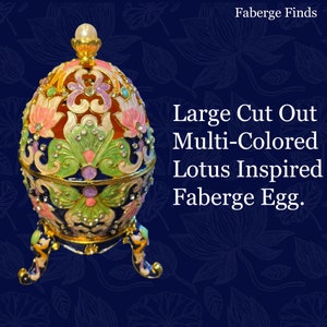 Faberge type new egg inspired by a lotus. A must for any collector! Beautiful floral colors and Swarovski crystals. Stunning egg.
