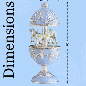 Light blue carousel and merry-go-round. This is a beautiful lavender baby blue mix enamel. Austrian crystals 6 plays spring