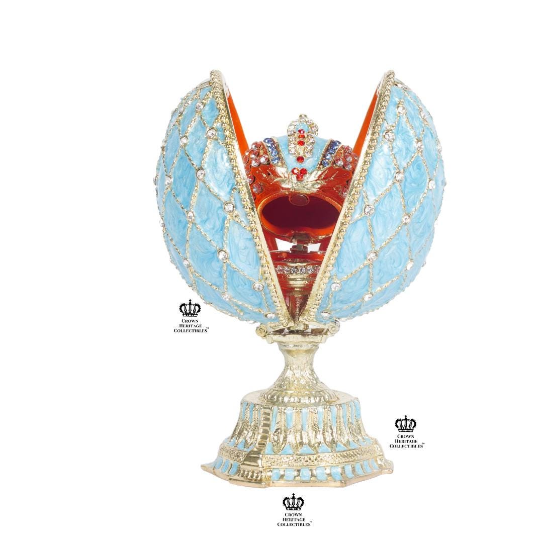 Sky Blue Faberge egg in with matching crown inside.This is lace collection Swarovski crystals.Beautiful color crown is 1” egg 5” gift decor