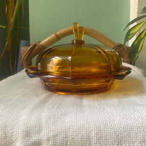 Mantequera Art Déco de vidrio ámbar