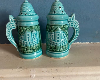 Mid century vintage porcelain salt and pepper shakers.