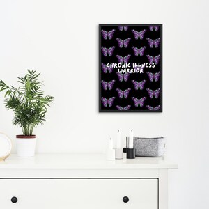 May include: Black and white framed print with a pattern of purple butterflies and the text "Chronic Illness Warrior".