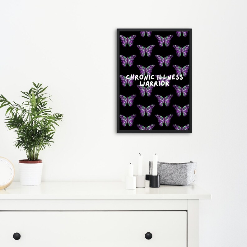 May include: Black and white framed print with a pattern of purple butterflies and the text "Chronic Illness Warrior".