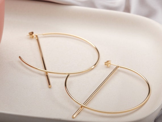 Hoop earrings hotsell with line through
