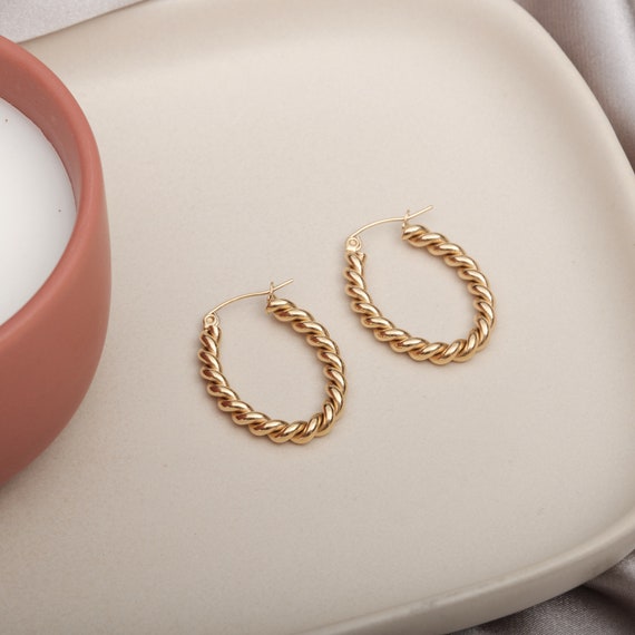 Twisted oval store hoop earrings