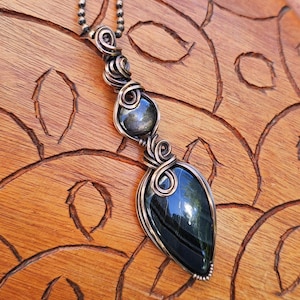 Black Star Ruby / Blue Tiger's eye dual pendant necklace wrapped in antiqued copper wire