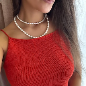 Knitted Red Color Bella Tank Top On Model.
